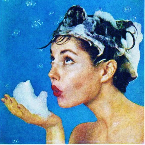 woman blowing soap bubbles