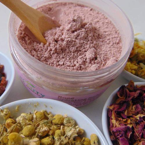 anti aging face mask pink surrounded by herbs