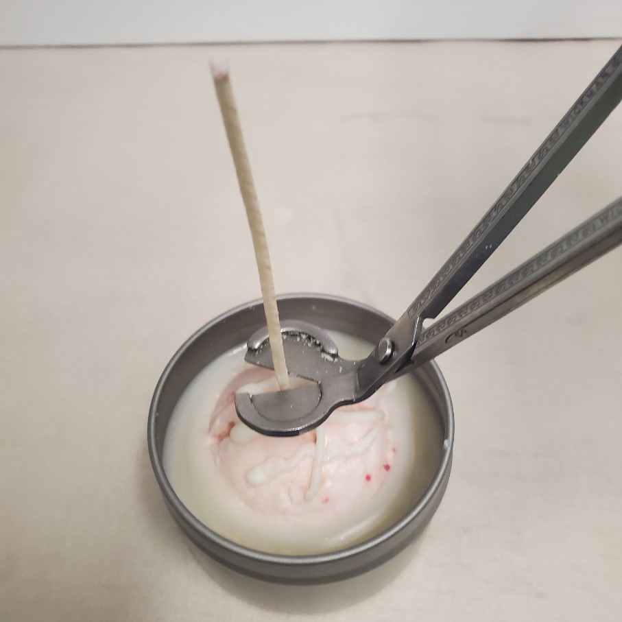 trimming ice cream candle wick