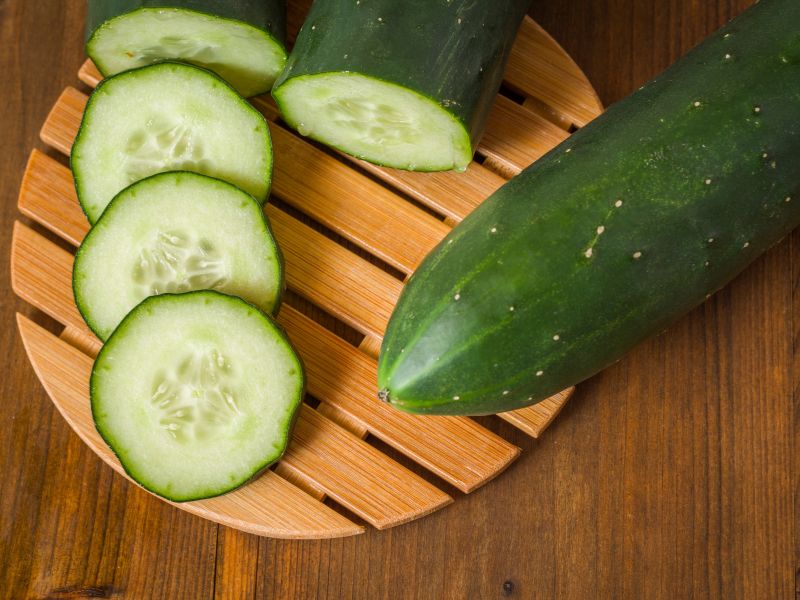 close up view of cucumber and cucumber slices