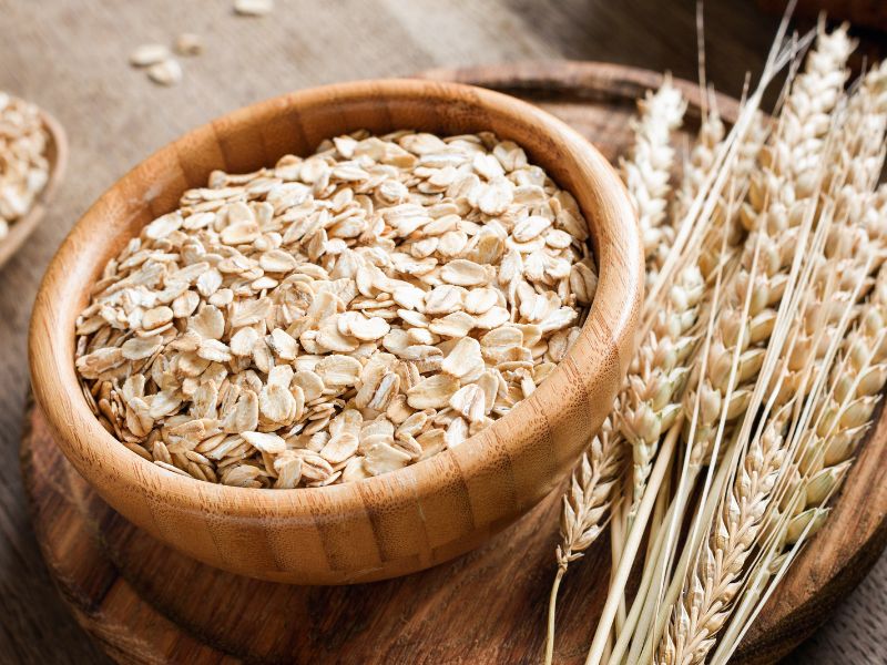 close up view of oatmeal and oat plants